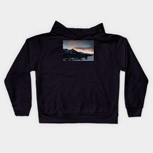 Dawn approaching behind the mountains Kids Hoodie